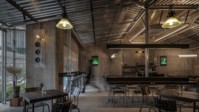 An Miên Lumiere Cafe — không gian thép mạ kẽm và ánh sáng vàng