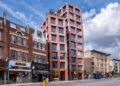 Petra Heights nhìn từ đường Finchley, khung đá lộ nguyên kết cấu