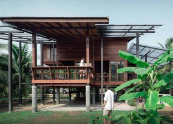 Ngôi nhà sàn gỗ ấm áp nằm giữa vườn dừa xanh mát - 1