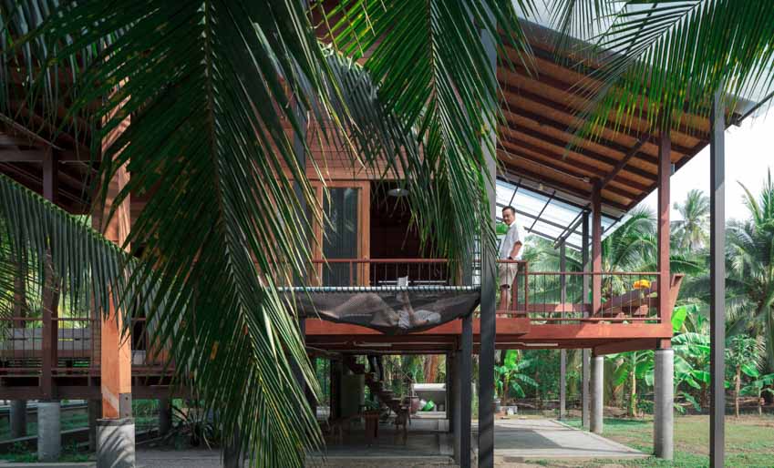 Ngôi nhà sàn gỗ ấm áp nằm giữa vườn dừa xanh mát - 2