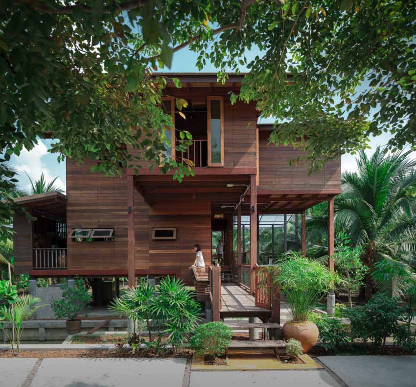 Ngôi nhà sàn gỗ ấm áp nằm giữa vườn dừa xanh mát - 11