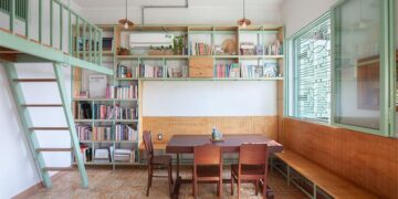 Không gian nội thất Tempo Nexus Library với gạch bông cũ được phục hồi, kệ gỗ và ánh sáng tự nhiên trong chung cư Lê Ngọc, 130 Pasteur TP.HCM - 9