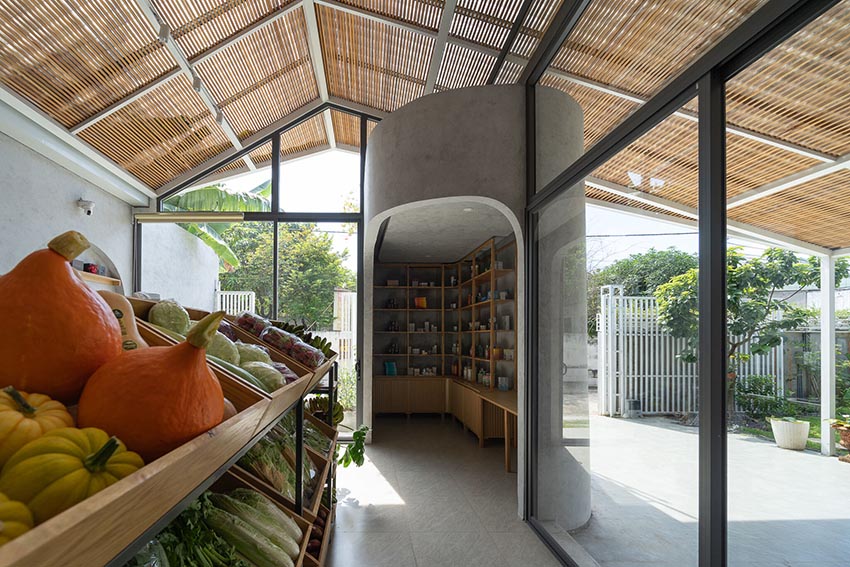 không gian shophouse Thy’s House tại Biên Hòa với mái kính, lam gỗ và vòm bê tông cong mềm mại - 11