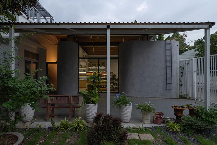 không gian shophouse Thy’s House tại Biên Hòa với mái kính, lam gỗ và vòm bê tông cong mềm mại - 5
